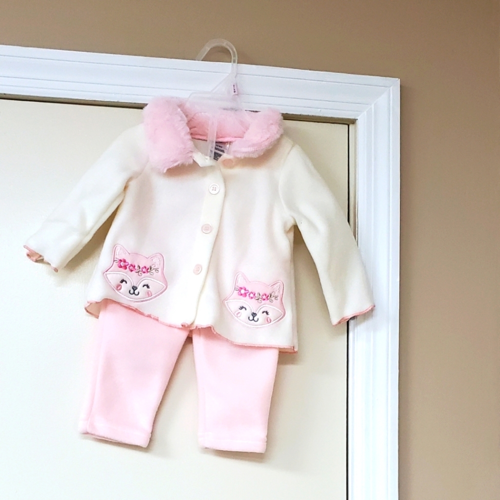 2 piece set fur around the collar 3/6 months. Never worn